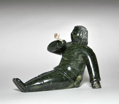 36. MAN SMOKING PIPE