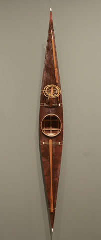 SKINNED KAYAK WITH HUNTING IMPLEMENTS