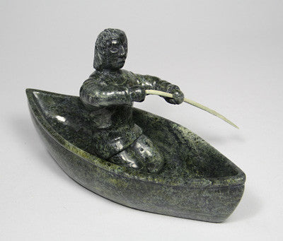 34. Paddling Canoe