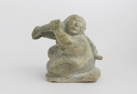 Woman Braiding Her Hair