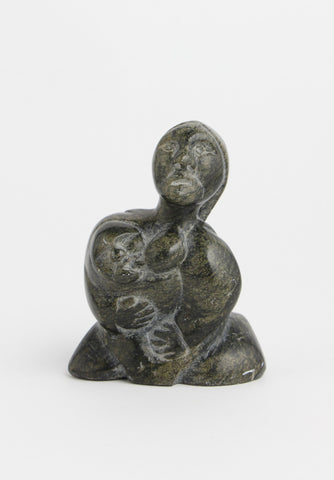Woman Nursing Child