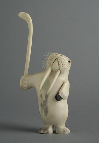 Hockey Player Walrus by Tommy Kuniliusse Inuit Artist from Clyde River